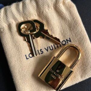 Louis Vuitton New Lock and Key with Dust Bag